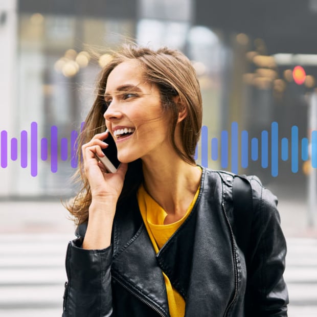 Image of a woman talking on phone with a purple and blue wave in the background to represent voice api